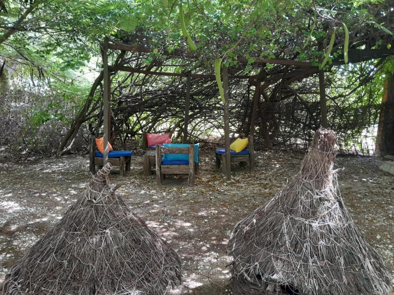 Les Collines De Niassam Villa Palmarin Bagian luar foto