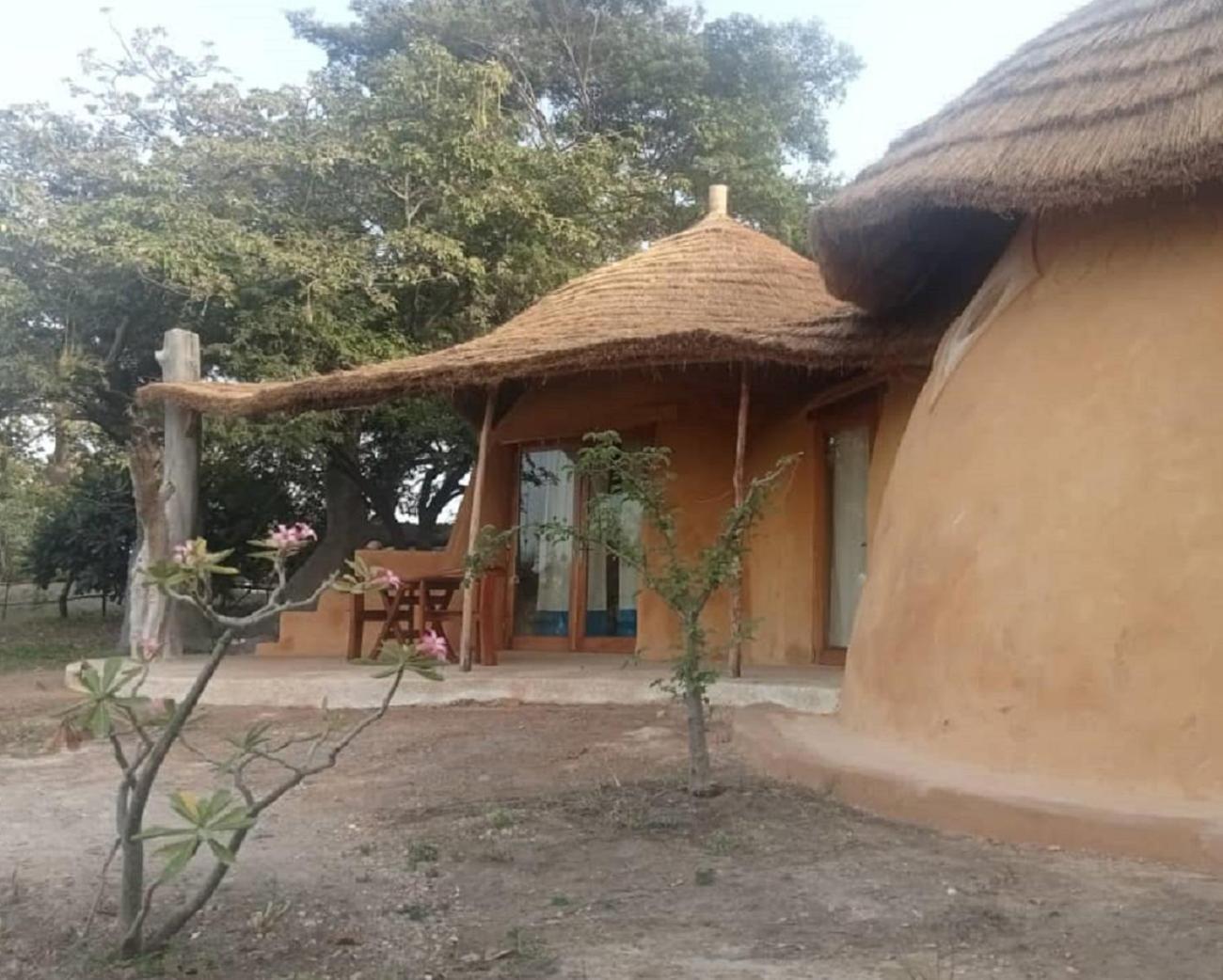 Les Collines De Niassam Villa Palmarin Bagian luar foto