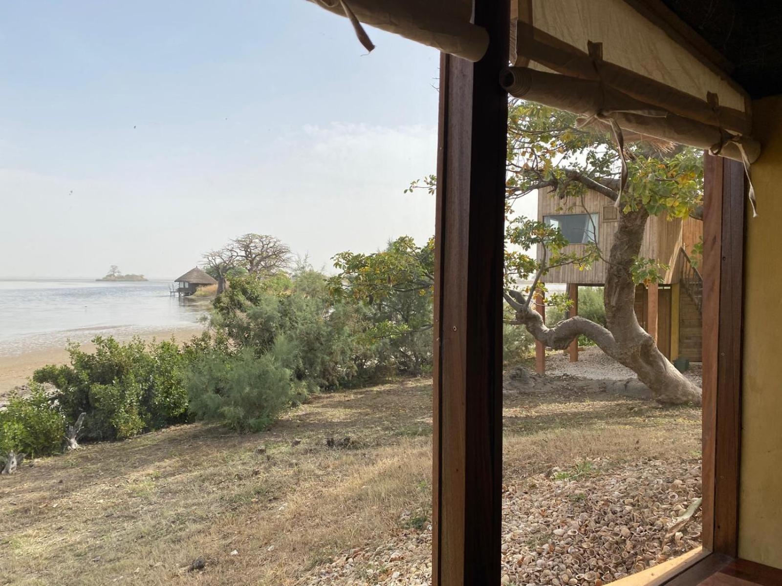 Les Collines De Niassam Villa Palmarin Bagian luar foto