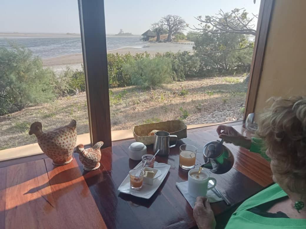 Les Collines De Niassam Villa Palmarin Bagian luar foto