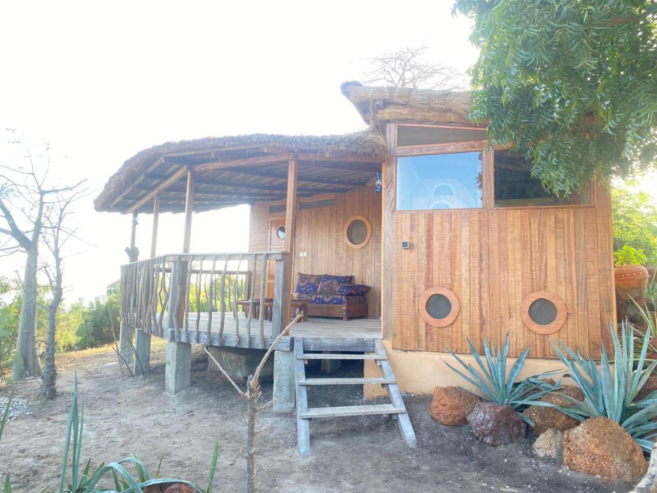 Les Collines De Niassam Villa Palmarin Bagian luar foto